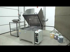 Machine de nettoyage par pulvérisation avec panier rotatif pour le nettoyage du bloc moteur